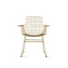 Metal wire chair with arms brass